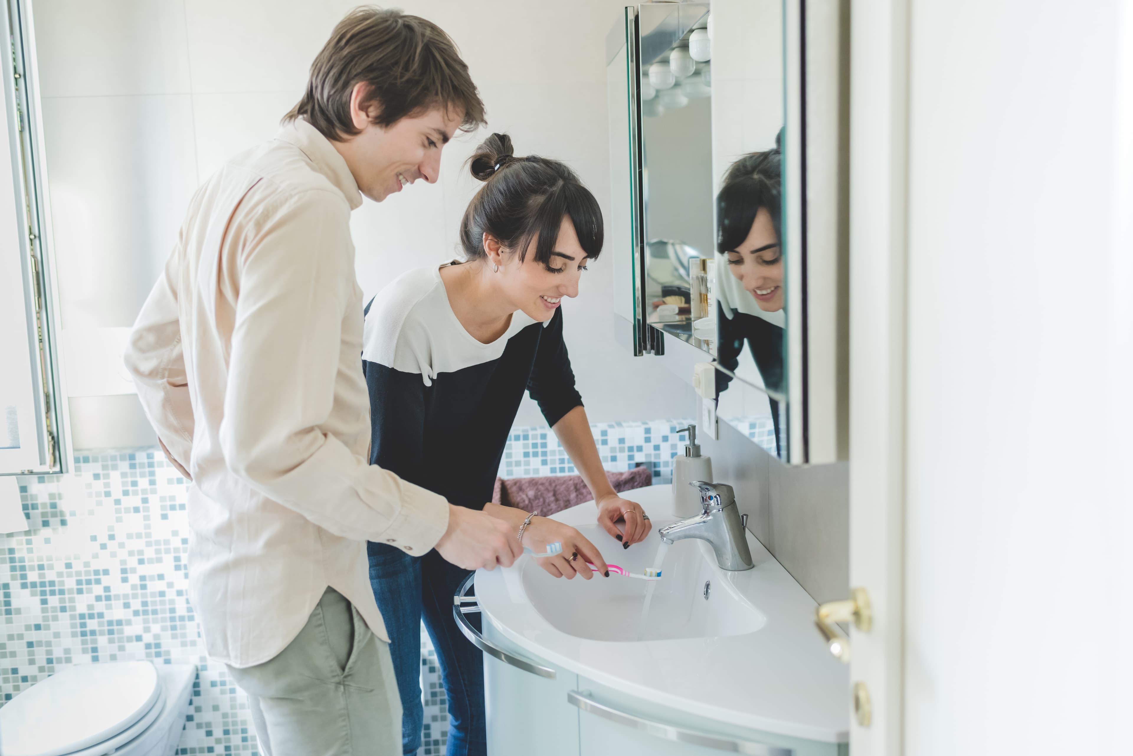 brushing teeth couple